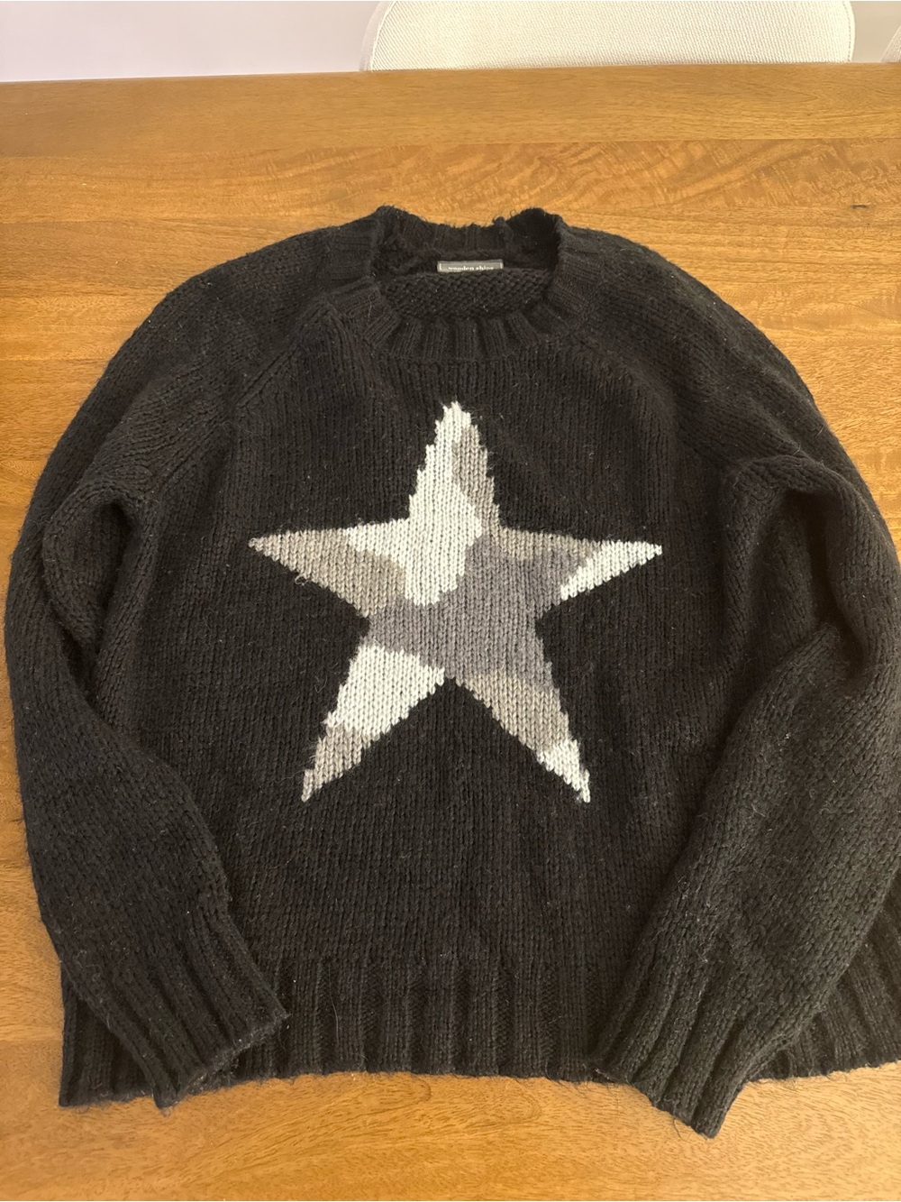 Wooden Ships Black Crewneck Sweater with Gray & White Star